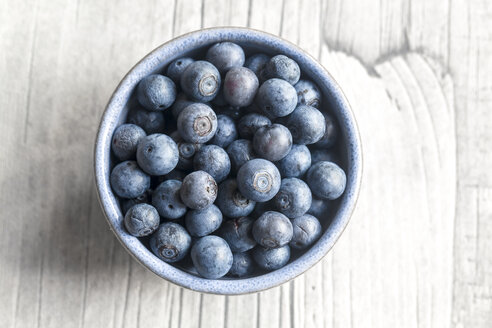 Bowl of blueberries on wood - SARF002620