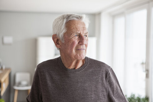 Portrait of pensive senior man at home - RBF004140