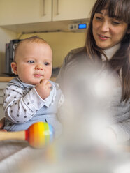 Mother and her little son together in the kitchen - LAF001624