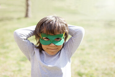 Portrait of little boy wearing green eye mask - VABF000345