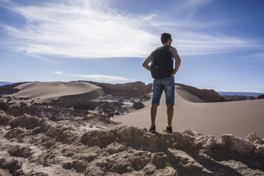 Chile, San Pedro de Atacama, Valley of the Moon, hiker in the desert - MAUF000358