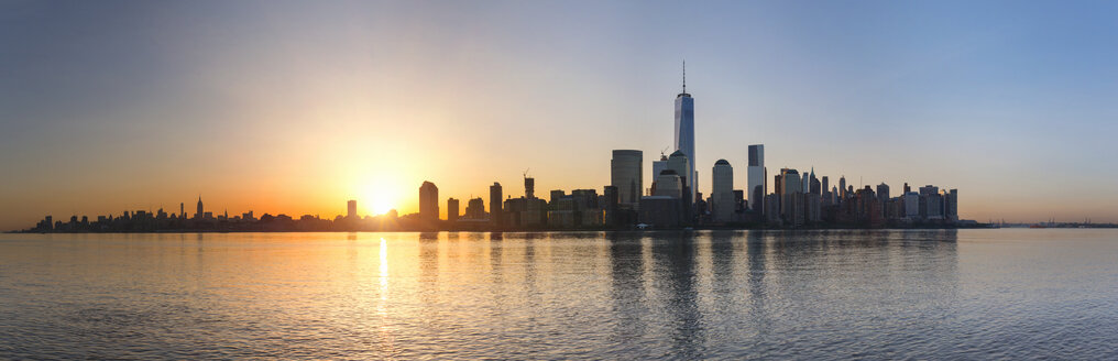 USA, New York City, Manhattan, panorama of financial district at sunrise - HSIF000438