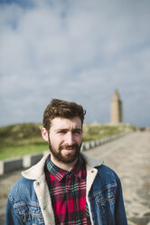 Spain, A Coruna, portrait of young man with brown hair and full beard - RAEF000942