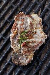 Pork collar cutlet on grill - CSF027338