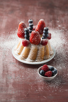 Mini Gugelhupf garnished with different berries - MYF001430
