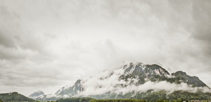 Austria, Anif, Mountainside in foggy weather - BMA000220