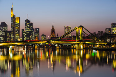 Germany, Hesse, Frankfurt, Floesserbruecke and financial district in the evening - WGF000843