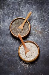 Wooden bowls of black and white chia seeds - CZF000247