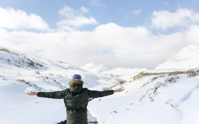 Spain, Asturias, man in snowy mountains - MGOF001661