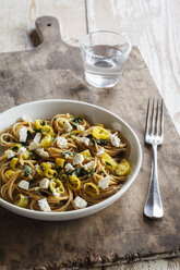 Plate of spelt whole grain spaghetti with feta and chili peppers - EVGF002906