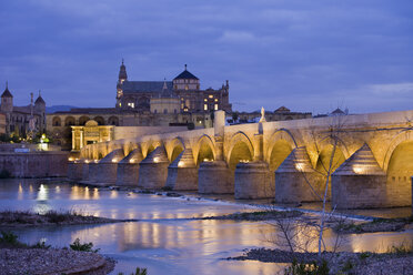 Spain, Andalusia, Cordoba, Mezquita Mosque Cathedral at dawn, Roman Bridge on Guadalquivir river - ABOF000085