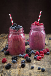 Two glasses of different fruit smoothies - LVF004706