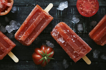 Tomato ice lollies on black wood - RTBF000087