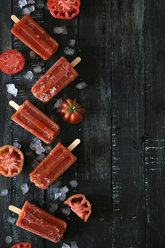 Tomato ice lollies on black wood - RTBF000088