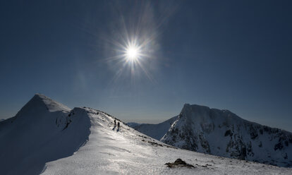 United Kingdom, Scotland, Ben Nevis, Carn Mor Dearg against the sun - ALRF000382