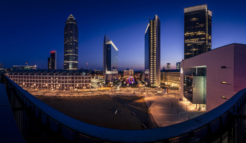 Germany, Frankfurt, View from Skyline Plaza, finanial district in the evening stock photo