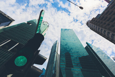 Singapore, Skyscrapers, green light, low angle view - GIO000877