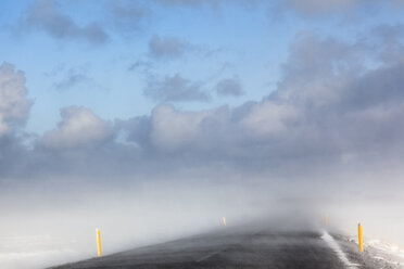 Iceland, Snaefellsnes, empty road, snow storm - FCF000920