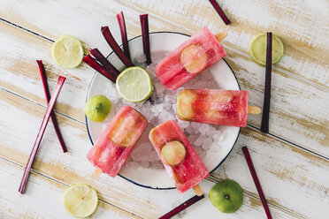 Beetroot and lime ice lollies on bowl - RTBF000125