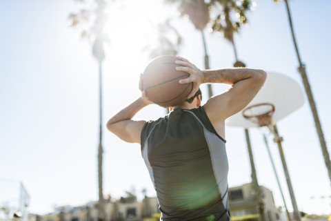 Young man practicing on outdoor court stock photo