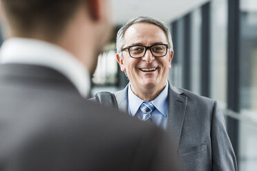 Portrait of smiling senior businessman - UUF007147