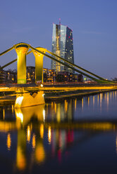 Germany, Hesse, Frankfurt, Main river and European Central Bank Headquarters in the evening - WGF000854