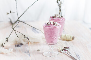 Two glasses of raspberry mousse with chocolate crumbs - SBDF002804