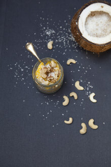 Chia pudding in glass, coconut, cashew nuts and coconut flakes - FAF000072
