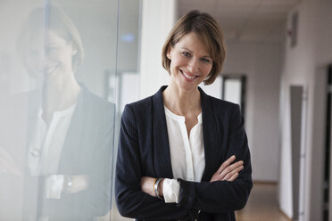 Portrait of confident businesswoman - RBF004440