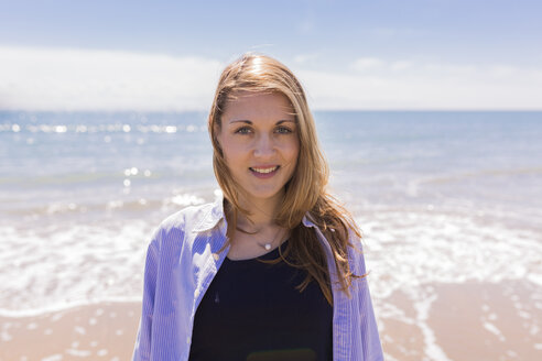 Portrait of smiling young woman at seaside - BOYF000288