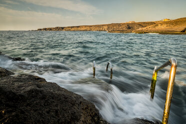 Spain, Tenerife, Beach, Swimming area at sunrise - SIPF000428