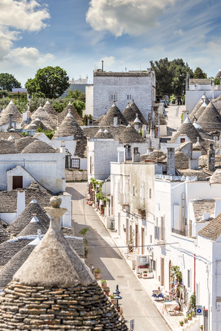 Italy, Apulia, Alberobello, Trulli, dry stone huts with conical roofs stock photo