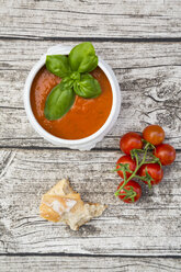 Tomato soup and tomatoes on wood - LVF004846