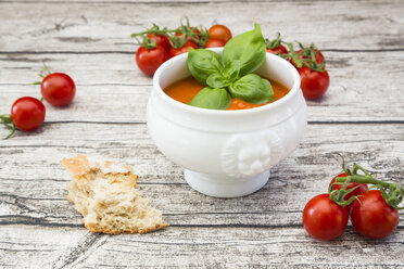 Tomato soup and tomatoes on wood - LVF004847