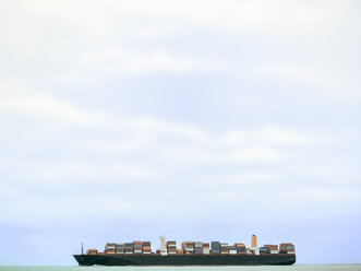 Germany, near Cuxhaven, North Sea, loaded container ship - KRPF001746