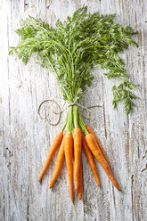 Bunch of carrots on wood - KSWF001763