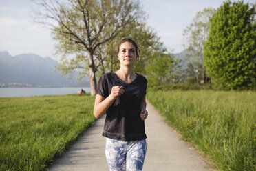 Young woman running in the nature - MRAF000037