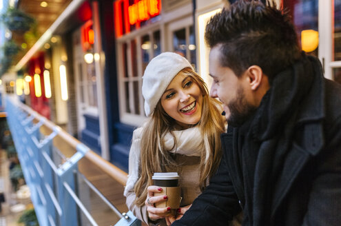 Smiling young woman looking at her boyfriend - MGOF001826