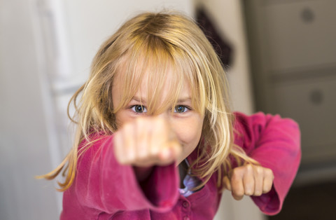 Little girl training self defence stock photo