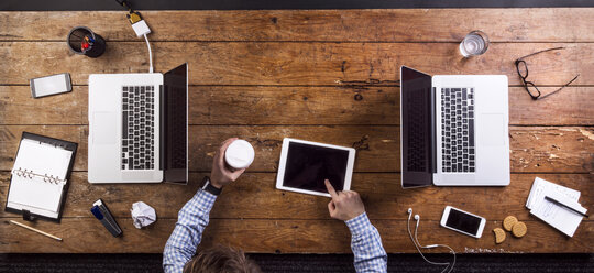 Young man working with digital tablet - HAPF000441