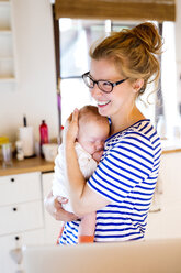 Happy mother with baby at home - HAPF000470