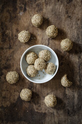 Bowl of small vegan balls made of quinoa flakes, sesame, sunflower and hemp seed - EVGF002965