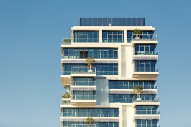 Germany, Berlin, upper section of modern apartment tower - TAMF000497