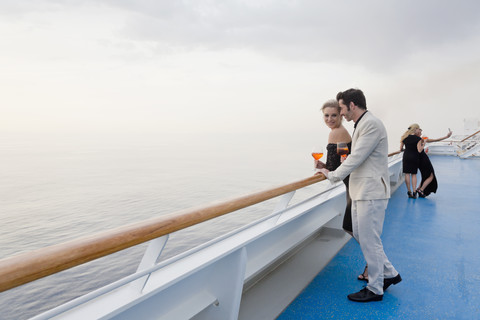 Four people with aperitive on deck of a cruise liner stock photo