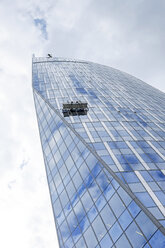 Belgium, Liege, view to facade of modern office tower with facade elevator - HLF000980