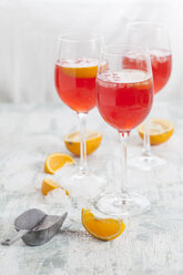 Aperol spritz, bitter liqueur, prosecco wine, sparkling mineral water and orange slice - SBDF002897