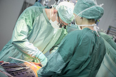 Heart surgeon during a heart operation - MWEF000085