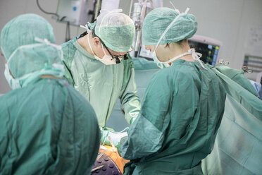 Heart surgeons during a heart operation - MWEF000086