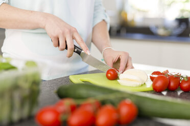 Close-up Of Woman's Hand Chopping Vegetables With Knife In Kitchen Stock  Photo, Picture and Royalty Free Image. Image 56706435.