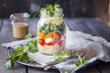 Rainbow salad in a jar, quinoa, tomatoes, mozzarella, spinach, pea sprouts, dressing aside - SBDF002921